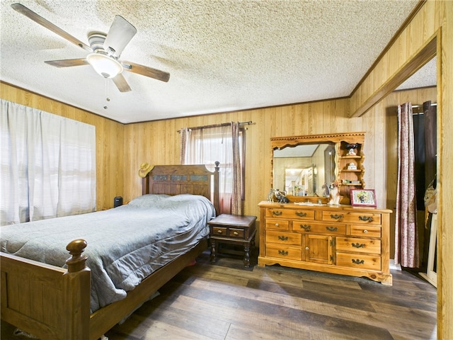 1029 Barden Brk, Ceres, PA 16731 - bedroom with a textured ceiling, wood walls, wood finished floors, and ceiling fan