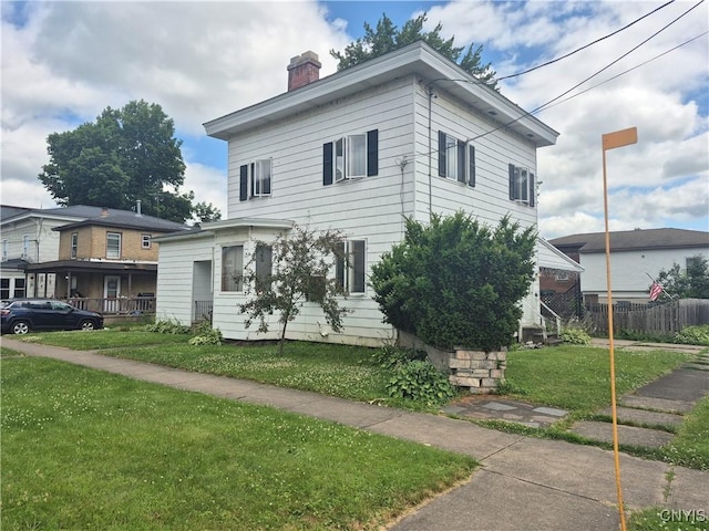 313 W 3rd St S, Fulton, NY 13069 - view of front of home with a chimney
