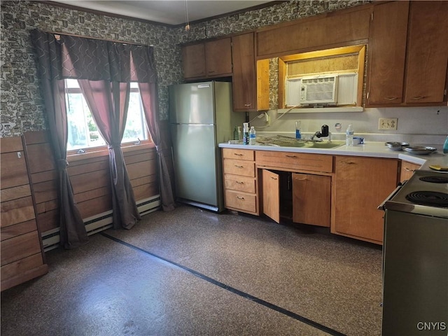313 W 3rd St S, Fulton, NY 13069 - kitchen featuring freestanding refrigerator, electric range, light countertops, wallpapered walls, and a wall unit AC