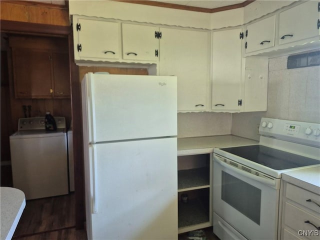 313 W 3rd St S, Fulton, NY 13069 - kitchen with white appliances, light countertops, separate washer and dryer, white cabinets, and dark wood-style floors