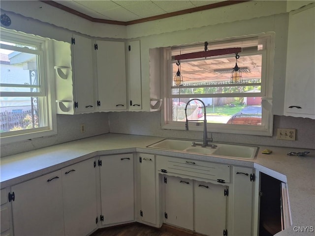 313 W 3rd St S, Fulton, NY 13069 - kitchen featuring light countertops and white cabinets
