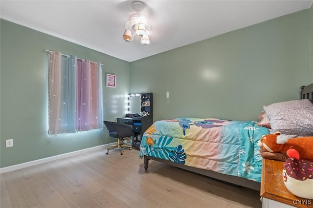 13489 Case Rd, Lyme, NY 13622 - bedroom with wood finished floors and baseboards