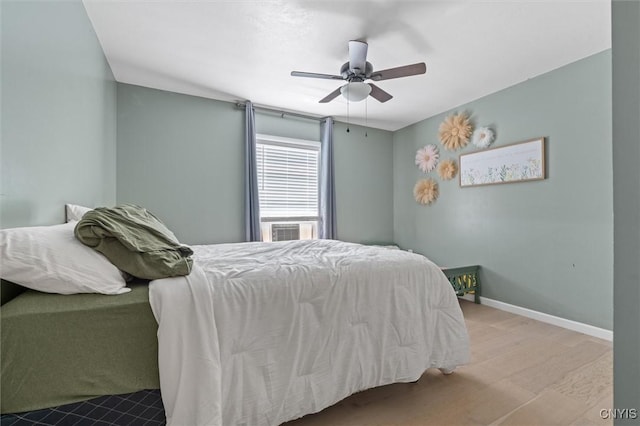 13489 Case Rd, Lyme, NY 13622 - bedroom with wood finished floors and a ceiling fan