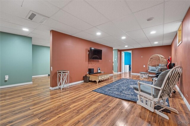 13489 Case Rd, Lyme, NY 13622 - living area with wood finished floors, a drop ceiling, and recessed lighting