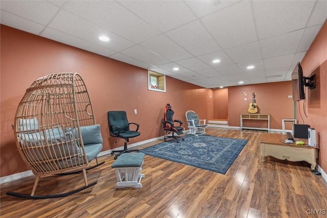 13489 Case Rd, Lyme, NY 13622 - living area featuring wood finished floors, a drop ceiling, recessed lighting, and a baseboard heating unit