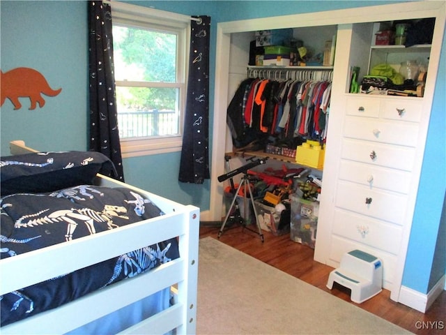 7739 Roberts St, Lenox, NY 13032 - bedroom featuring a closet and wood finished floors