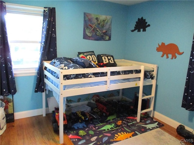 7739 Roberts St, Lenox, NY 13032 - bedroom with wood finished floors