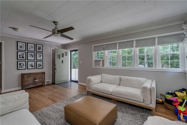 266 Chestnut St, Watertown City, NY 13601 - living area featuring crown molding, wood finished floors, ceiling fan, and cooling unit