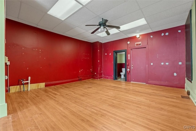 116 W Manlius St, Dewitt, NY 13057 - spare room with wood finished floors, ceiling fan, and a paneled ceiling