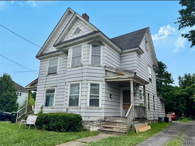 176-178 E Clark St, German Flatts, NY 13357 - victorian home with a chimney and a front yard