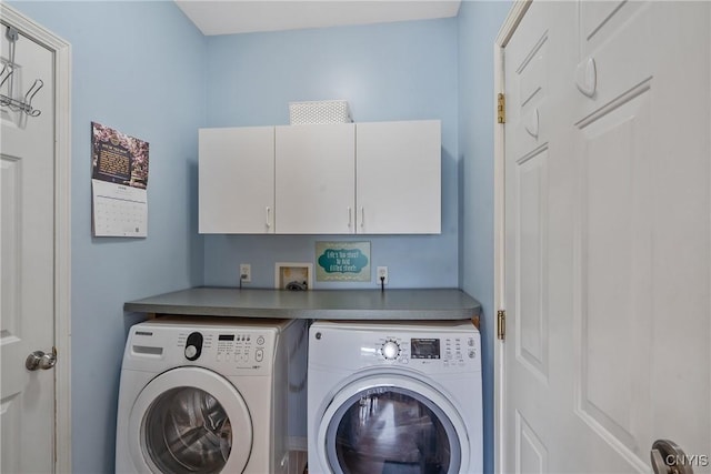 8879 Kilkenny Dr, Lysander, NY 13027 - laundry room featuring cabinet space and washing machine and clothes dryer