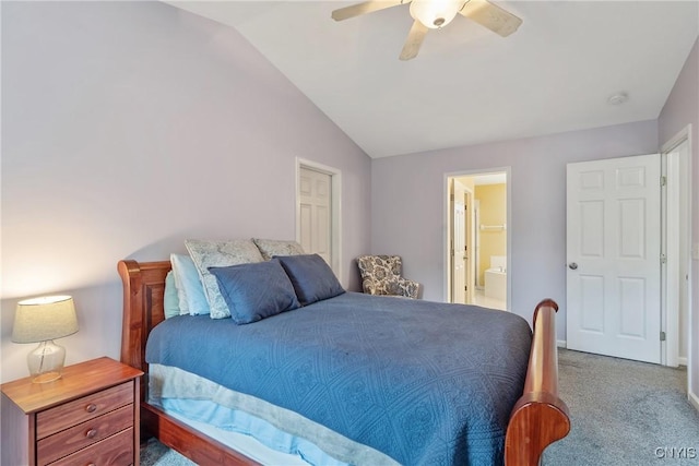 8879 Kilkenny Dr, Lysander, NY 13027 - carpeted bedroom featuring vaulted ceiling, ensuite bath, and a ceiling fan