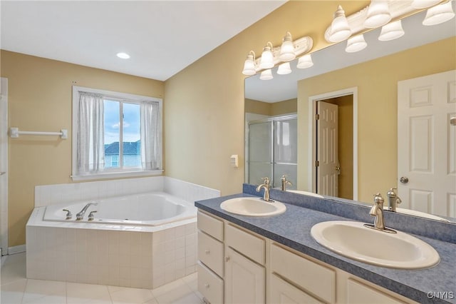 8879 Kilkenny Dr, Lysander, NY 13027 - bathroom with a shower stall, a garden tub, double vanity, and tile patterned floors
