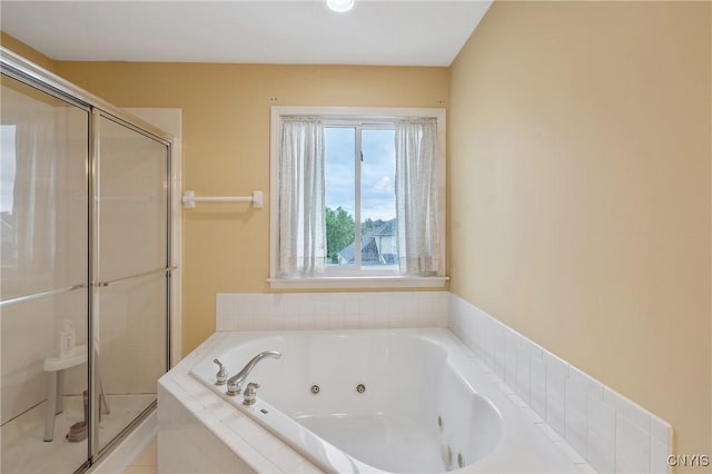 8879 Kilkenny Dr, Lysander, NY 13027 - full bath with a shower stall and a tub with jets