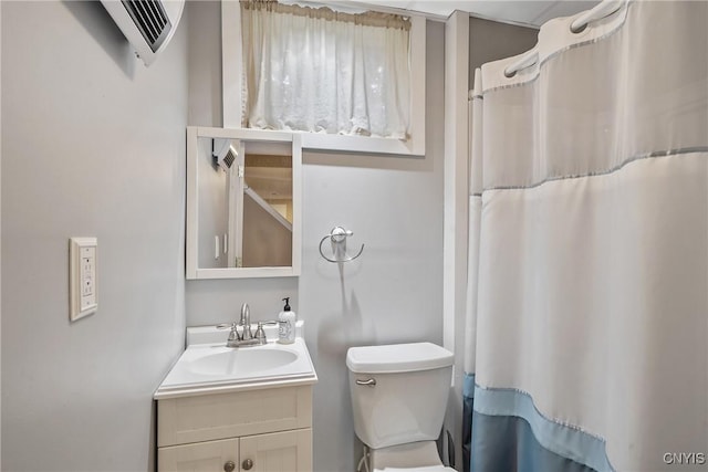 8879 Kilkenny Dr, Lysander, NY 13027 - bathroom with vanity, a wall mounted air conditioner, and a shower with curtain