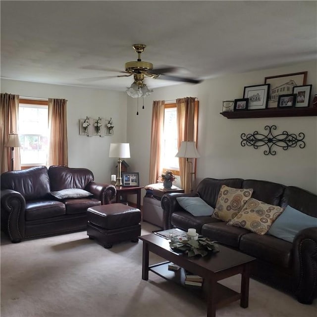 56 Briarcliff, Horseheads, NY 14845 - carpeted living room featuring healthy amount of natural light and a ceiling fan