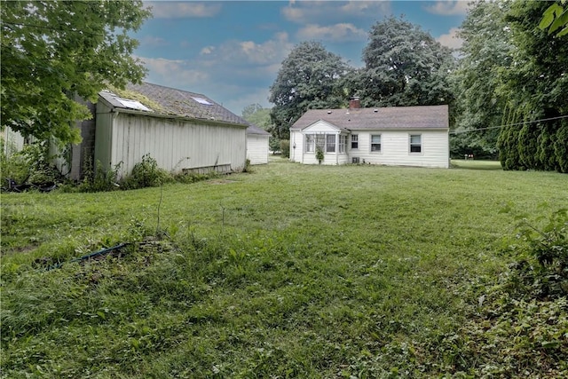 5978 State Route 21st Hwy, Williamson, NY 14589 - view of green lawn featuring an outdoor structure
