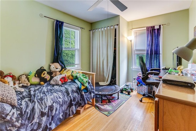 5978 State Route 21st Hwy, Williamson, NY 14589 - bedroom featuring wood finished floors and a ceiling fan