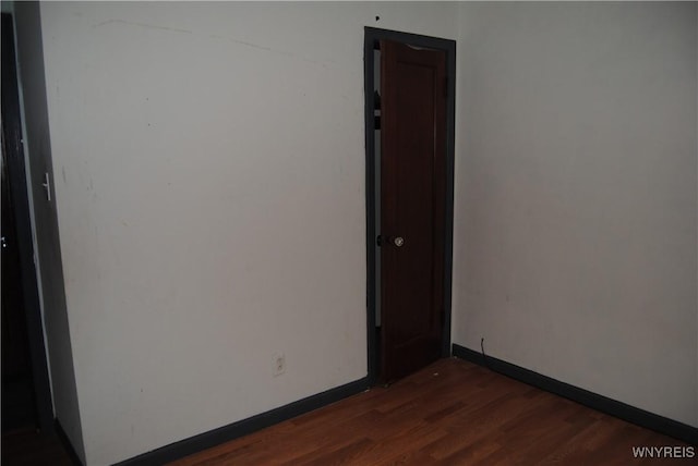 3028 Welch Ave, Niagara Falls, NY 14303 - unfurnished room with dark wood-style floors and baseboards