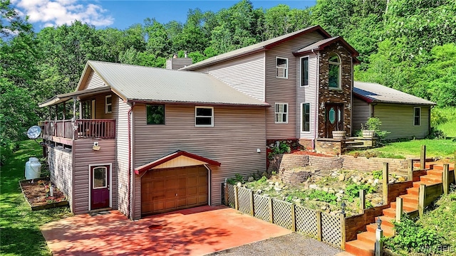 2035 Centerline Rd, Sheldon, NY 14167 - view of front of property featuring driveway, an attached garage, a balcony, and a chimney