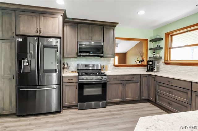 2035 Centerline Rd, Sheldon, NY 14167 - kitchen with appliances with stainless steel finishes, light countertops, tasteful backsplash, light wood-style floors, and recessed lighting