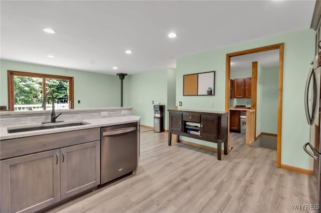 2035 Centerline Rd, Sheldon, NY 14167 - kitchen with stainless steel appliances, light wood-type flooring, recessed lighting, and light stone countertops
