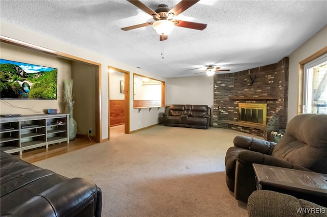 2035 Centerline Rd, Sheldon, NY 14167 - living area with ceiling fan, a textured ceiling, carpet, and a fireplace