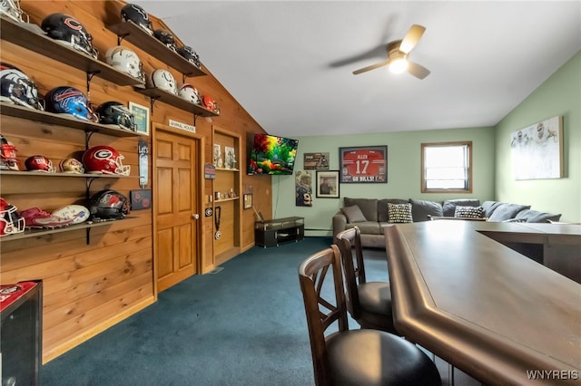 2035 Centerline Rd, Sheldon, NY 14167 - living area with lofted ceiling, dark colored carpet, a ceiling fan, and a baseboard radiator