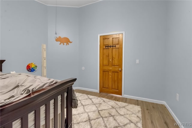 2035 Centerline Rd, Sheldon, NY 14167 - bedroom with light wood-style flooring and crown molding