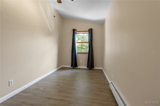 2035 Centerline Rd, Sheldon, NY 14167 - empty room featuring a baseboard heating unit, lofted ceiling, a ceiling fan, and wood finished floors