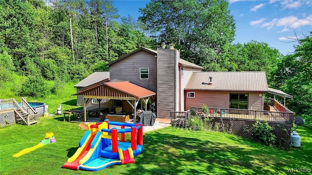 2035 Centerline Rd, Sheldon, NY 14167 - back of property featuring a gazebo, a yard, a chimney, and a wooden deck