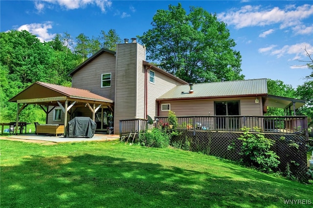 2035 Centerline Rd, Sheldon, NY 14167 - back of property featuring a lawn, a patio area, a chimney, and a deck