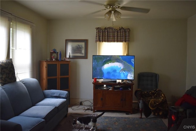 20 E Main St, Cortland, NY 13045 - living area with a ceiling fan