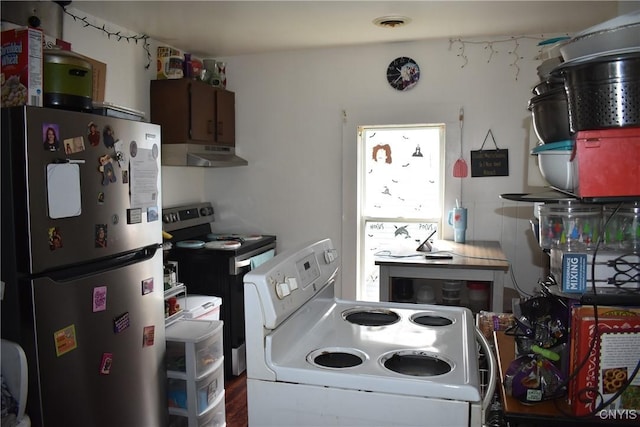 20 E Main St, Cortland, NY 13045 - kitchen with appliances with stainless steel finishes and under cabinet range hood