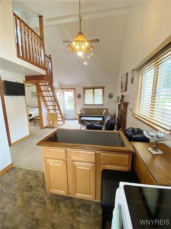 5436 Java Lake Rd, Java, NY 14009 - kitchen featuring high vaulted ceiling, decorative light fixtures, and a peninsula