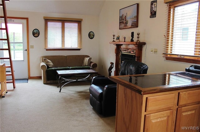 5436 Java Lake Rd, Java, NY 14009 - living area featuring light colored carpet, vaulted ceiling, and a fireplace