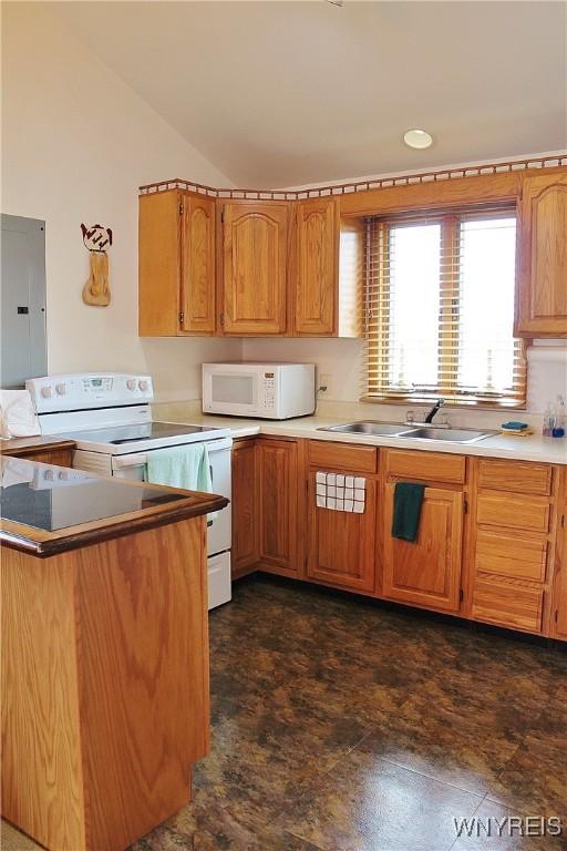5436 Java Lake Rd, Java, NY 14009 - kitchen featuring white appliances, electric panel, light countertops, and vaulted ceiling
