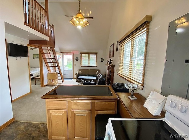 5436 Java Lake Rd, Java, NY 14009 - kitchen with range, dark countertops, high vaulted ceiling, a peninsula, and open floor plan