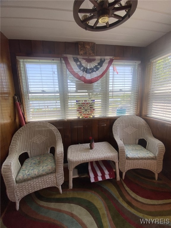 5436 Java Lake Rd, Java, NY 14009 - sitting room featuring ceiling fan and wood walls