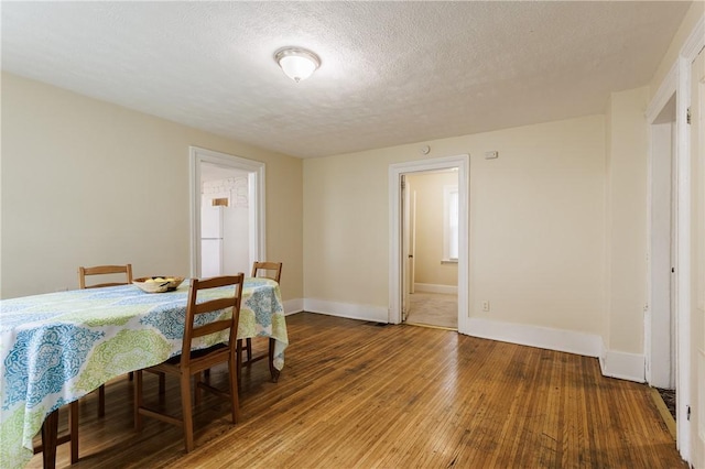 72 Weld St, Rochester, NY 14605 - dining space featuring a textured ceiling and wood-type flooring