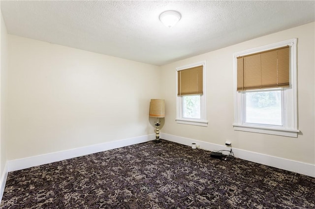 72 Weld St, Rochester, NY 14605 - carpeted spare room featuring a textured ceiling