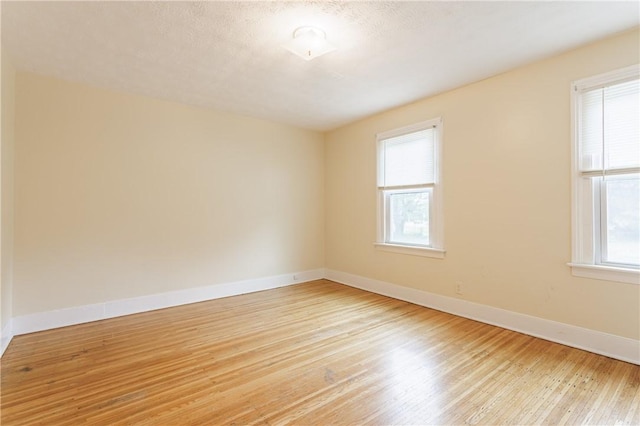 72 Weld St, Rochester, NY 14605 - spare room with light wood finished floors and baseboards