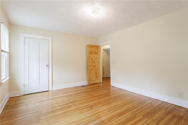 72 Weld St, Rochester, NY 14605 - unfurnished bedroom featuring light wood finished floors and baseboards