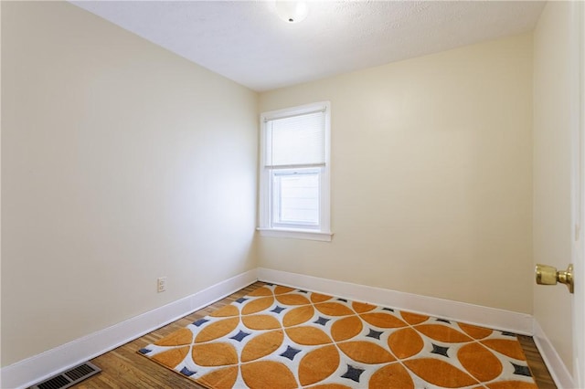 72 Weld St, Rochester, NY 14605 - spare room with baseboards