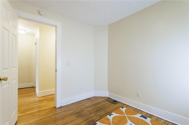 72 Weld St, Rochester, NY 14605 - unfurnished room with light wood-style flooring and a smoke detector