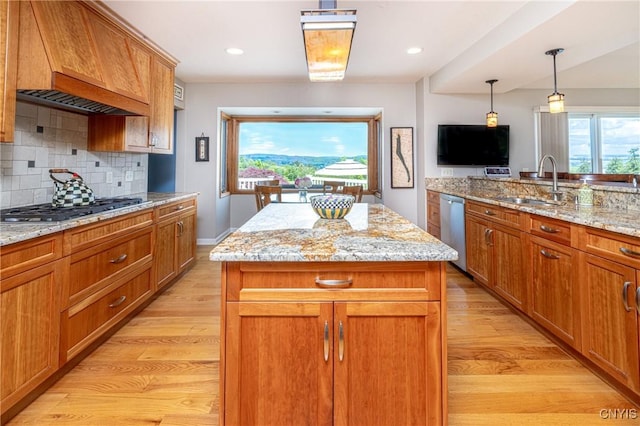 2516 W Lake Rd, Skaneateles, NY 13152 - kitchen with appliances with stainless steel finishes, light wood-style floors, healthy amount of natural light, decorative backsplash, and recessed lighting