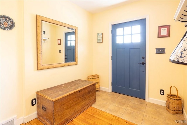 2516 W Lake Rd, Skaneateles, NY 13152 - foyer entrance with plenty of natural light and light tile patterned flooring