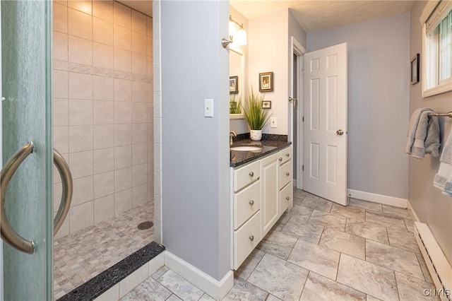2516 W Lake Rd, Skaneateles, NY 13152 - bathroom featuring a baseboard radiator, vanity, and tiled shower
