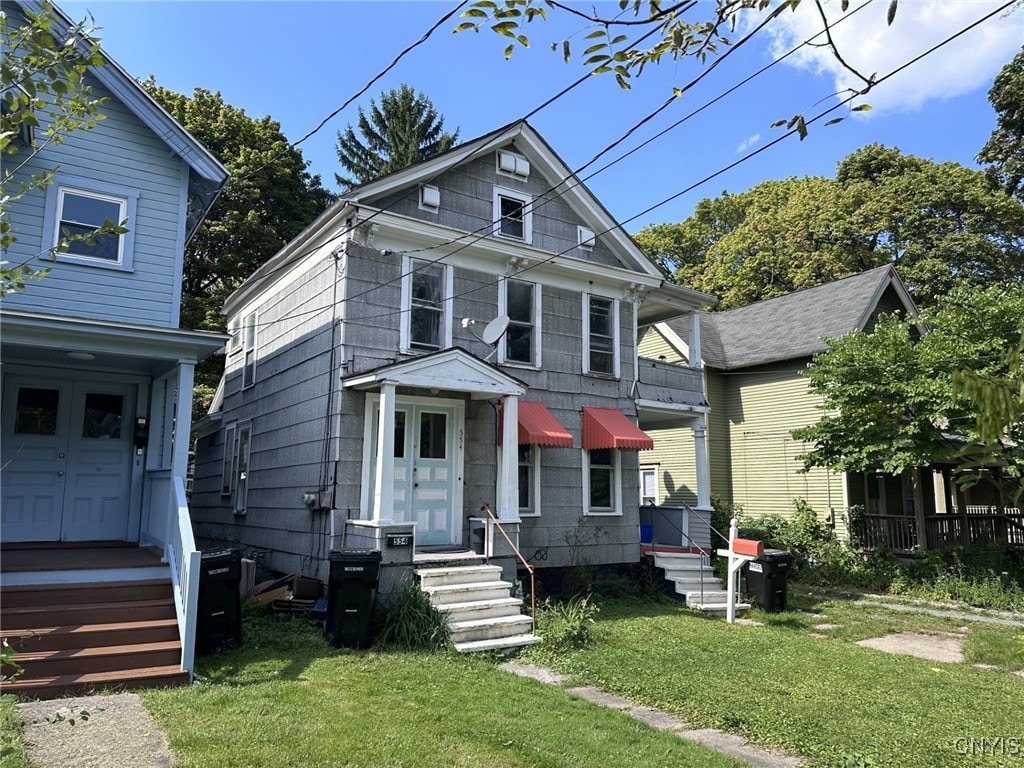 552-54 Columbus Ave, Syracuse, NY 13210 - view of front of property featuring a front lawn and entry steps