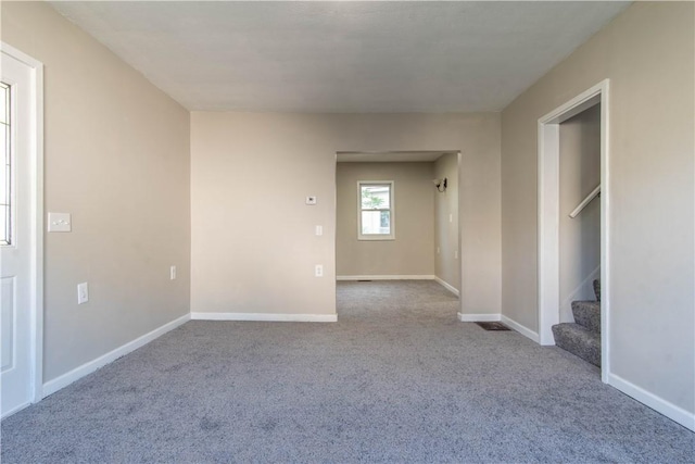 11 Grove St, Adams, NY 13605 - empty room featuring carpet flooring and stairway